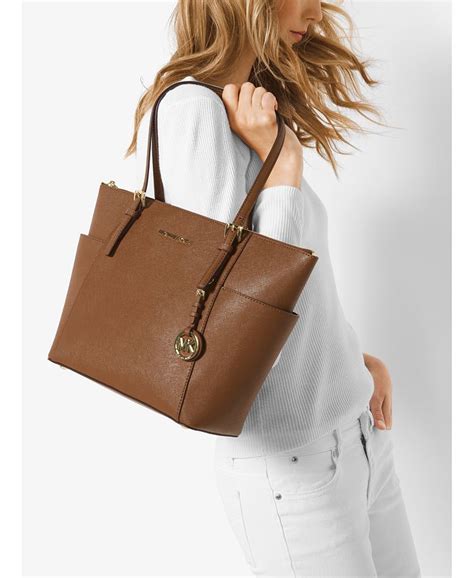 michael kors jet set east west top zip tote damson|Michael Michael Kors Logo Jet Set East West Top Zip Tote .